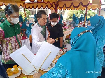 TP PKK Kotabaru Peringati HKG ke-49 Dengan Lomba Masak Menu Ikan dan Busana Kreasi Sasirangan