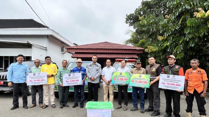 BUPATI DAN WABUP SIJUNJUNG SALURKAN BANTUAN KEMANUSIAAN