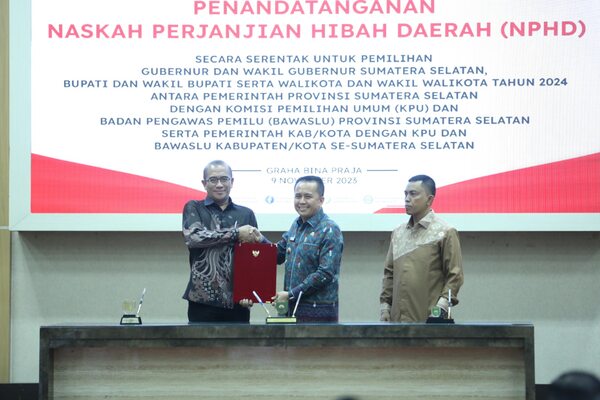 Pemerintah Provinsi, Kabupaten, dan Kota Se-Sumsel Serentak Tanda Tangani NPHD Dana Pilkada